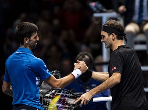 Novak Djokovic (L) and Roger Federer pictured at the 2019 Nitto ATP Finals | Image Source: Getty