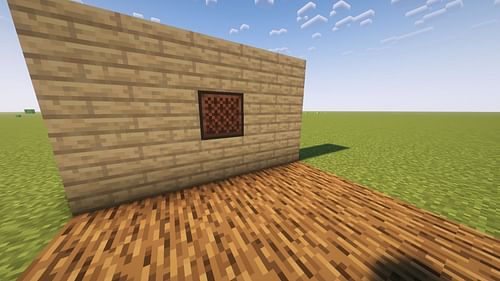 This Minecraft build begins with a jukebox inlaid in a wall (Image via Mojang)