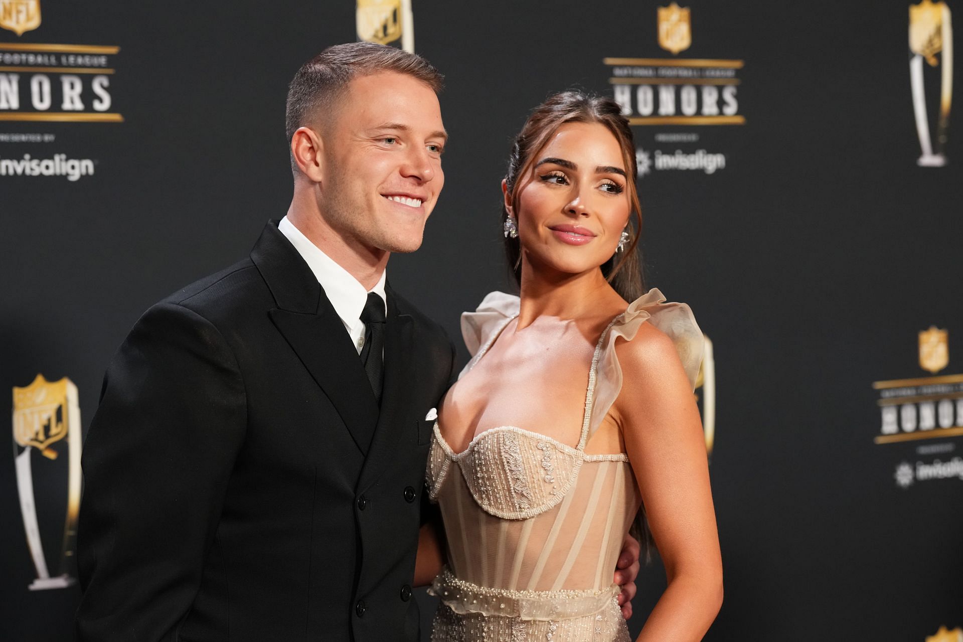 Christian McCaffrey (L) and Olivia Culpo (Source: Getty)