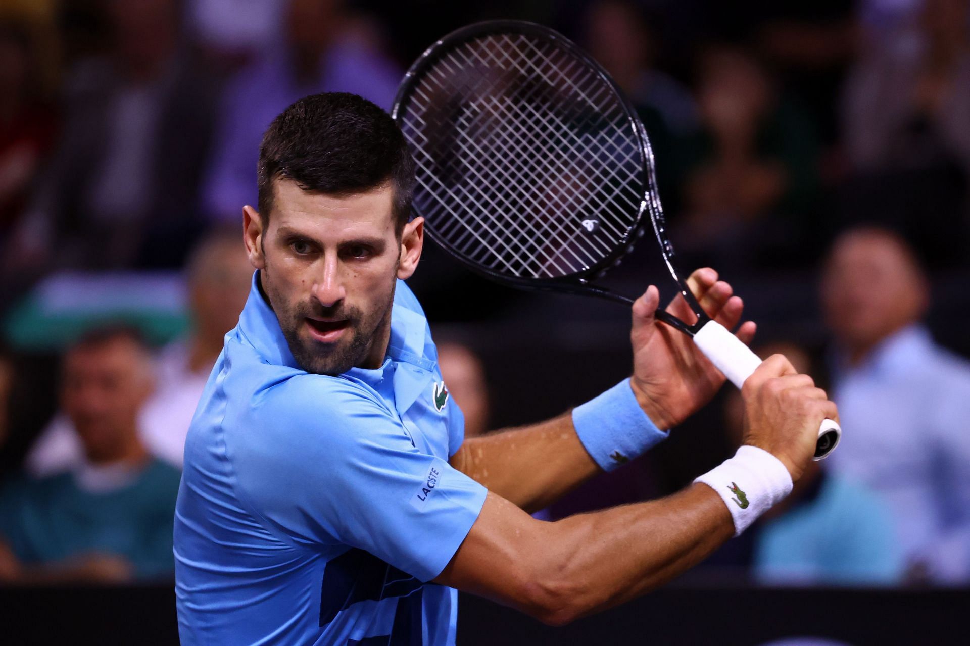 The Serb in action during an exhibition match against Grigor Dimitrov