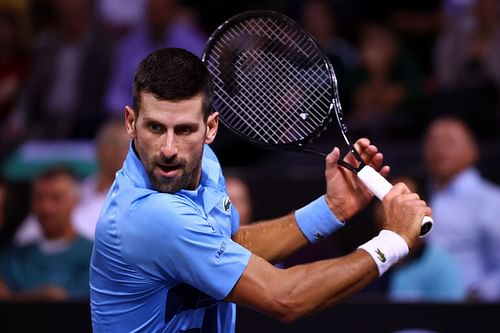 The Serb in action during an exhibition match against Grigor Dimitrov