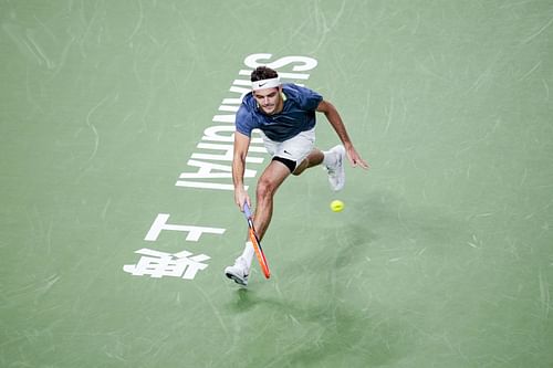 Taylor Fritz streches to make a forehand in the Shanghai Rolex Masters - Source: Getty