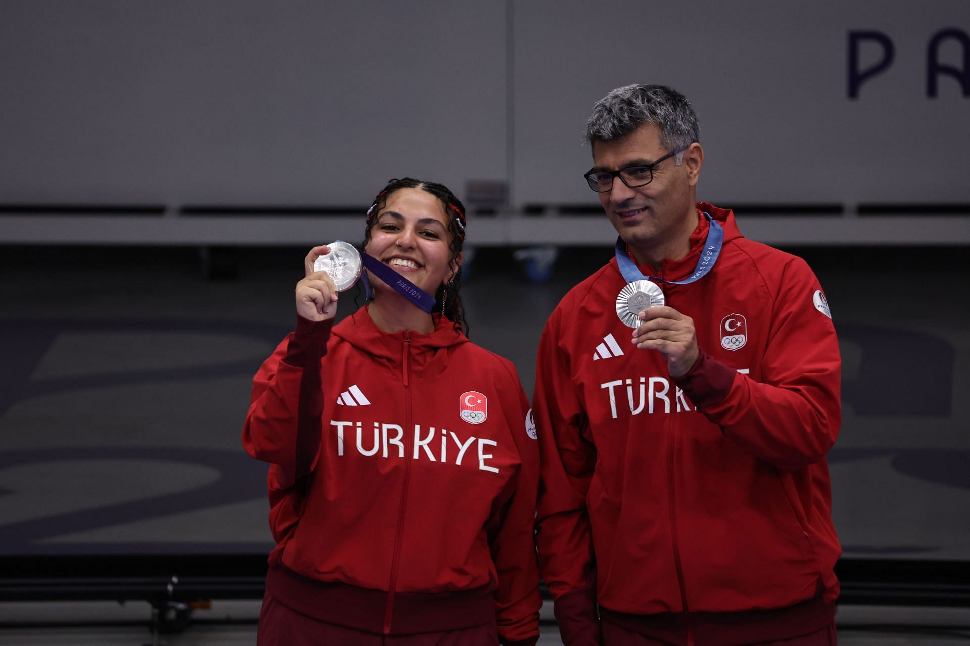 Yusuf Dikec (right) with his silver medal at the 2024 Paris Olympics (Image via: Getty Images)