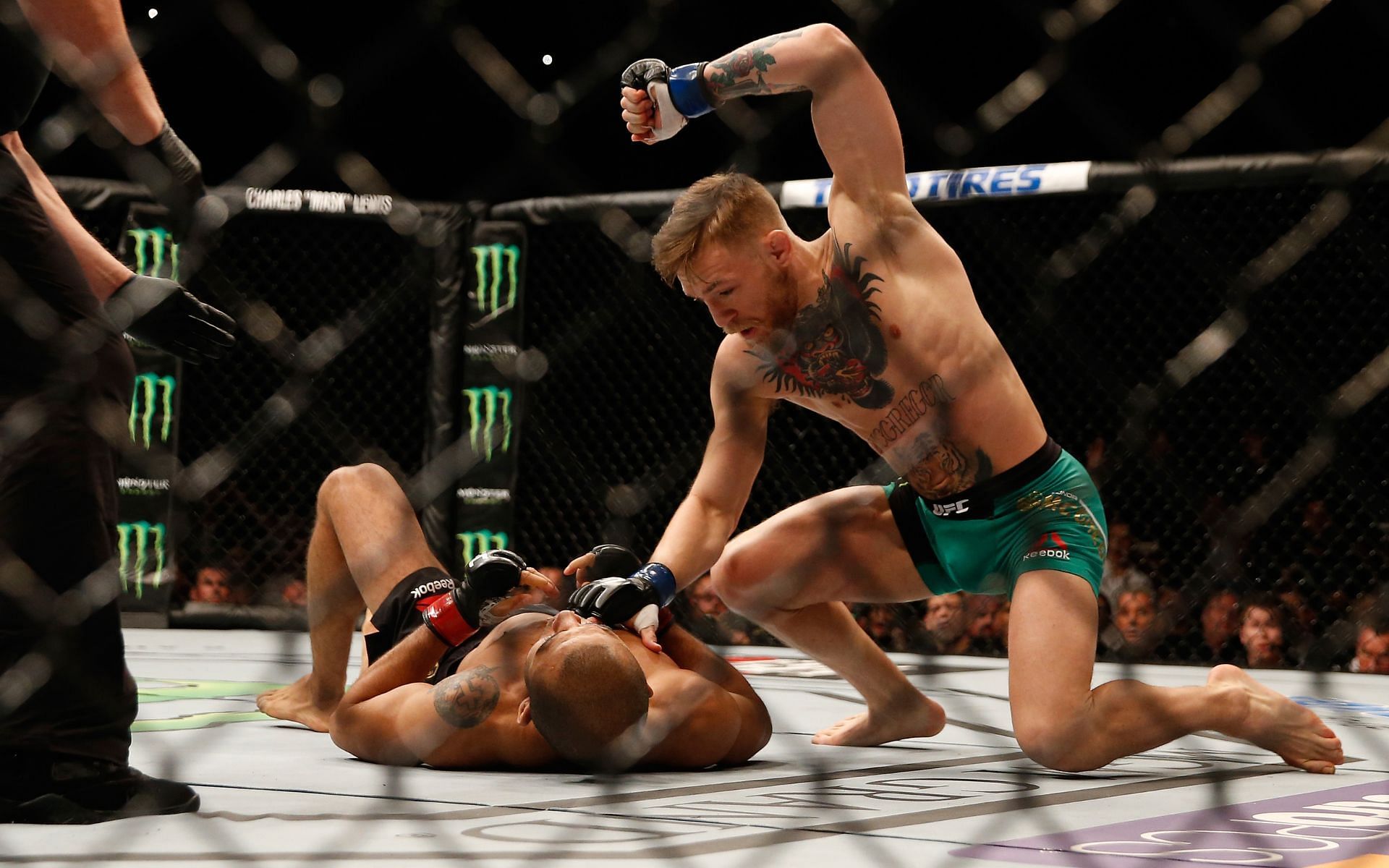 Conor McGregor (top) dominated Jose Aldo (bottom) in both the psychological and physical aspects of their fight [Image courtesy: Getty Images]