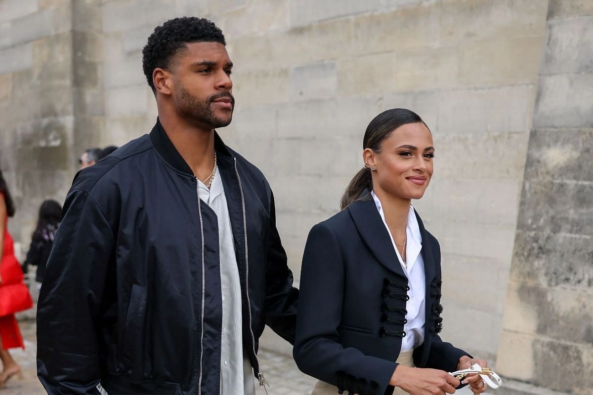 Sydney McLaughlin-Levrone and Andre Levrone at the Paris Fashion Week - Womenswear Spring/Summer 2023 - Source: Getty