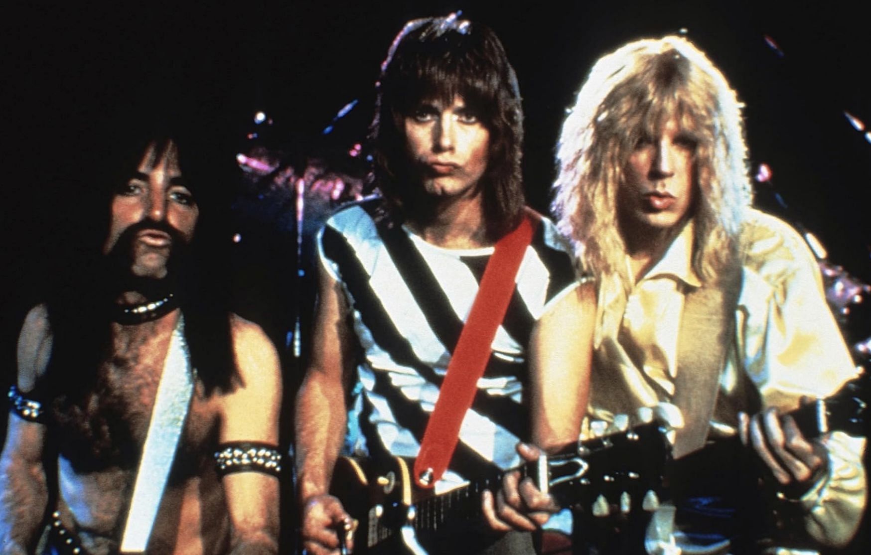 Christopher Guest, Michael McKean, Harry Shearer, and Spinal Tap in This Is Spinal Tap (Image via Embassy Pictures, Spinal Tap Productions)