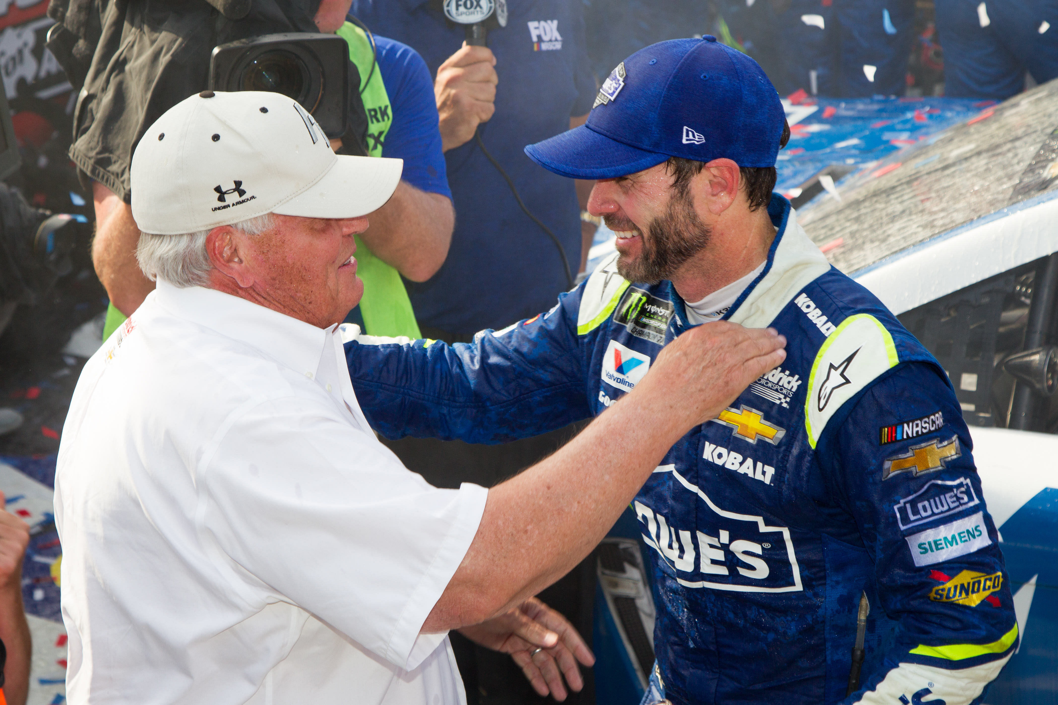 Rick Hendrick (left) and Jimmie Johnson (right) celebrating a win at Dover International Speedway in June 2017 (Source: Imagn)