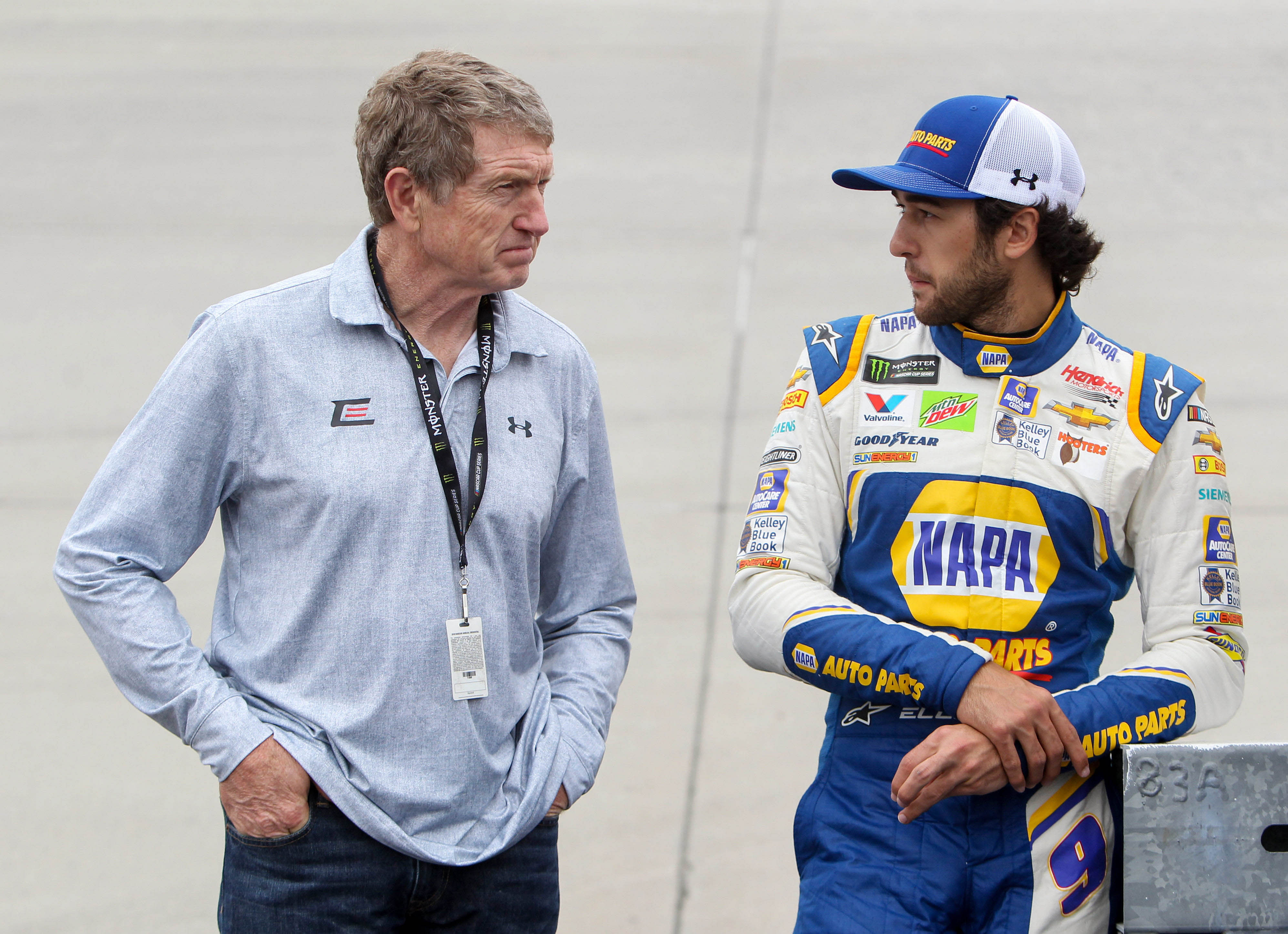 NASCAR Cup Series driver Chase Elliott (right) stands with his father and former driver Bill Elliott (left) Source: Imagn