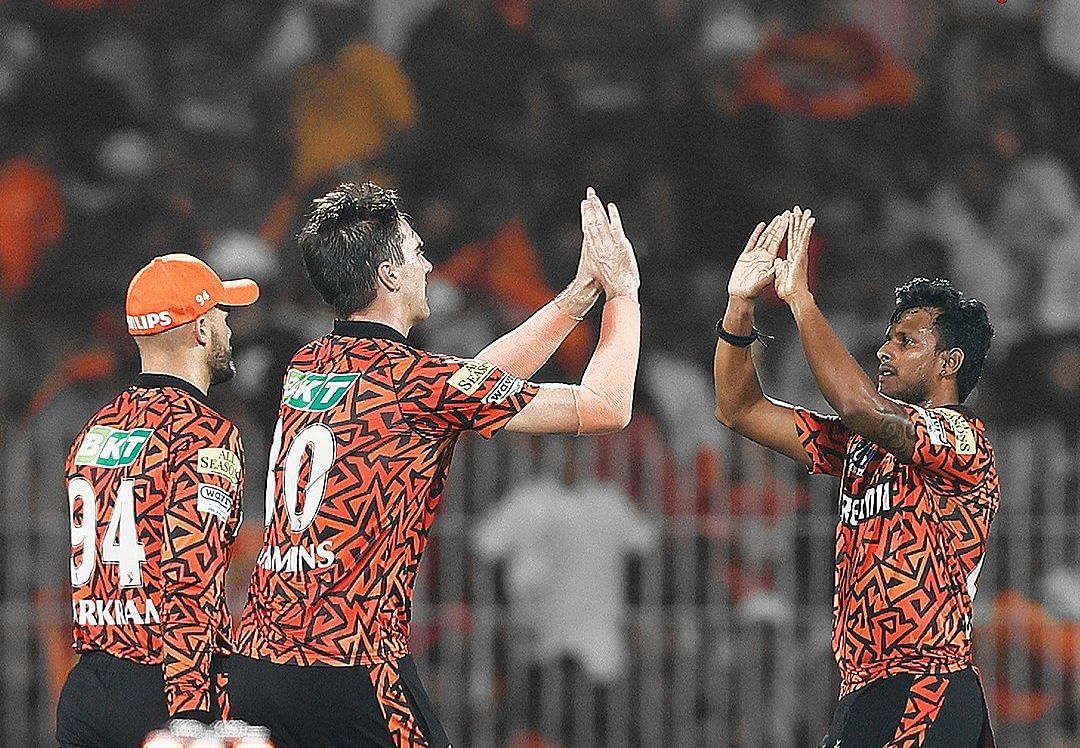 Pat Cummins celebrates a wicket with T Natarajan. (Credits: SRH Twitter)