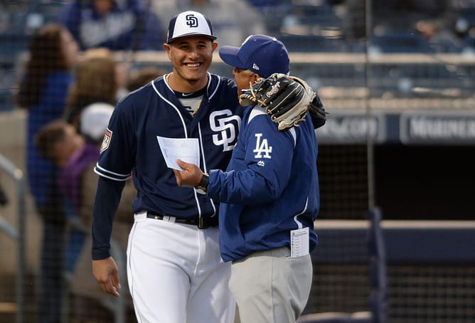 Watch: Footage of Manny Machado throwing a ball to Dodgers dugout that sparked tensions goes viral
