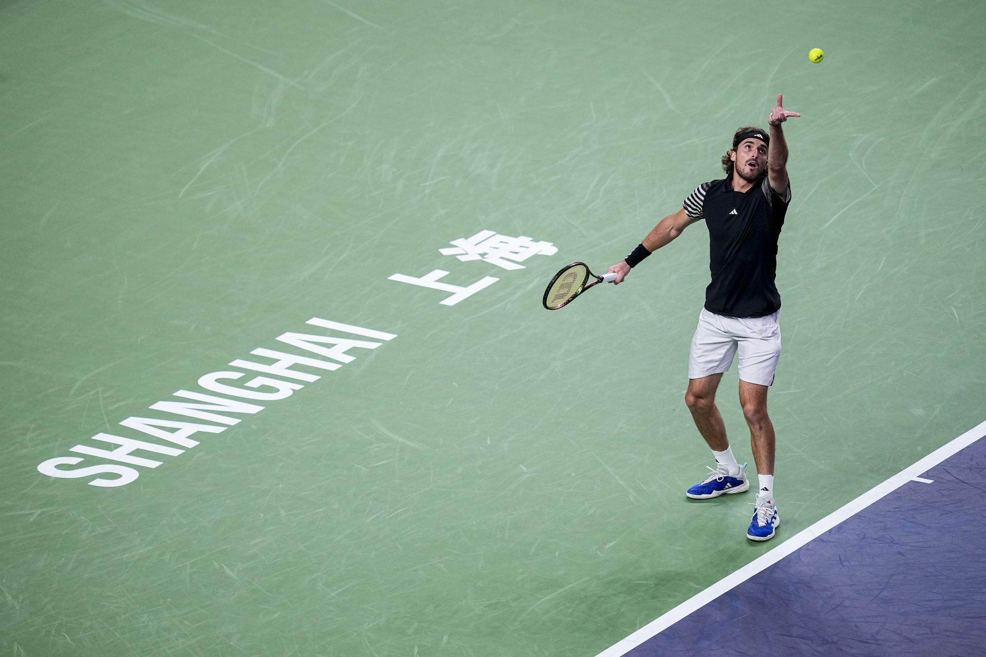 Tsitsipas prepares to serve in the Shanghai Rolex Masters - Source: Getty