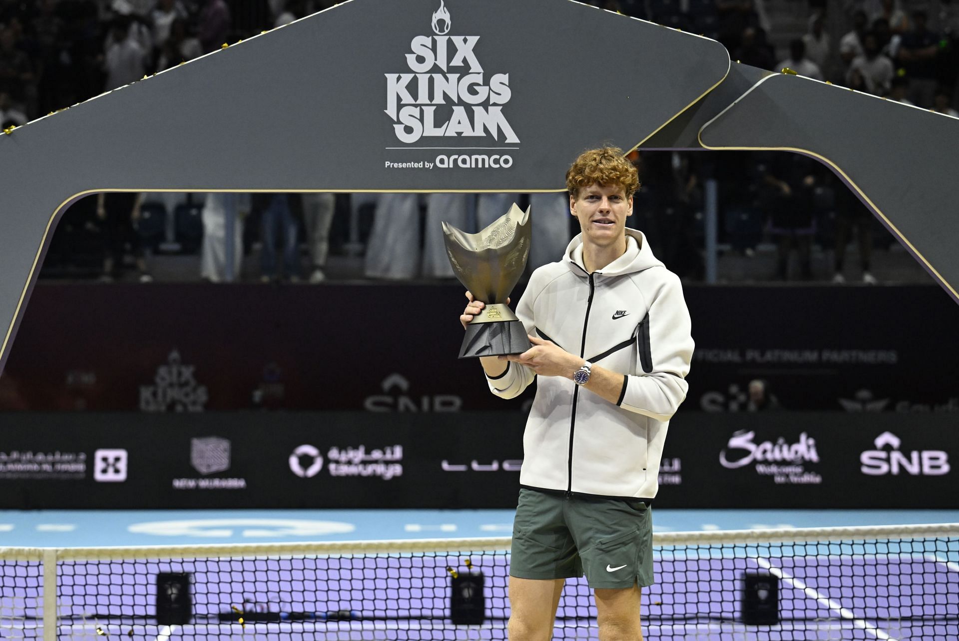 Jannik Sinner strikes a pose with the Six Kings Slam trophy (Source: Getty)