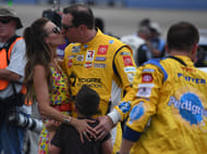 Kyle Busch (18) kisses his wife Samantha before the Ally 400 at Nashville Superspeedway (Source: Imagn)