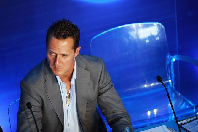 Questions raised over Michael Schumacher's latest reported public appearance by neurosurgeon