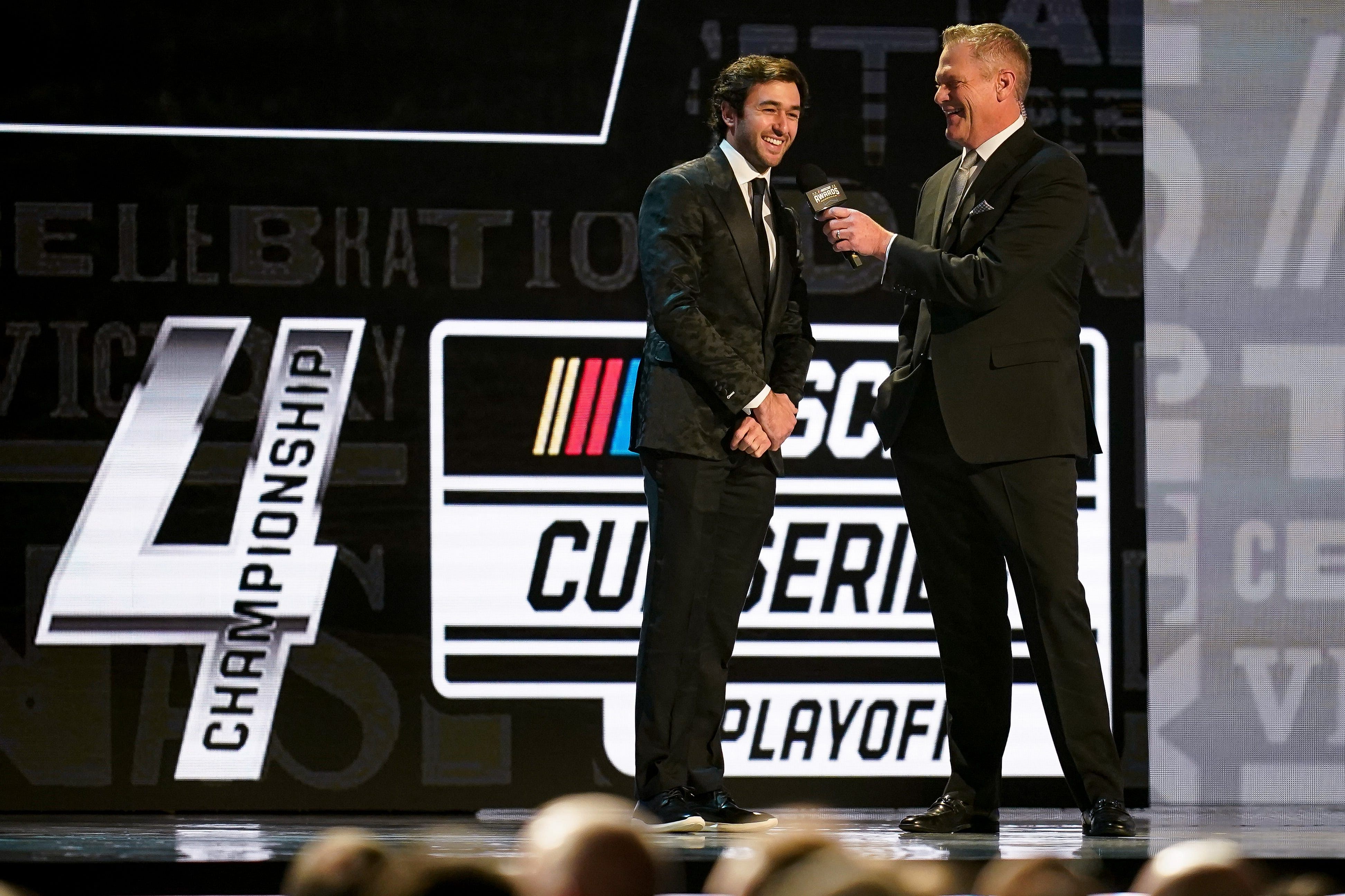 NASCAR Cup Series driver and fan favorite Chase Elliott, left, is interviewed by host Marty Snider. Source: Imagn Images