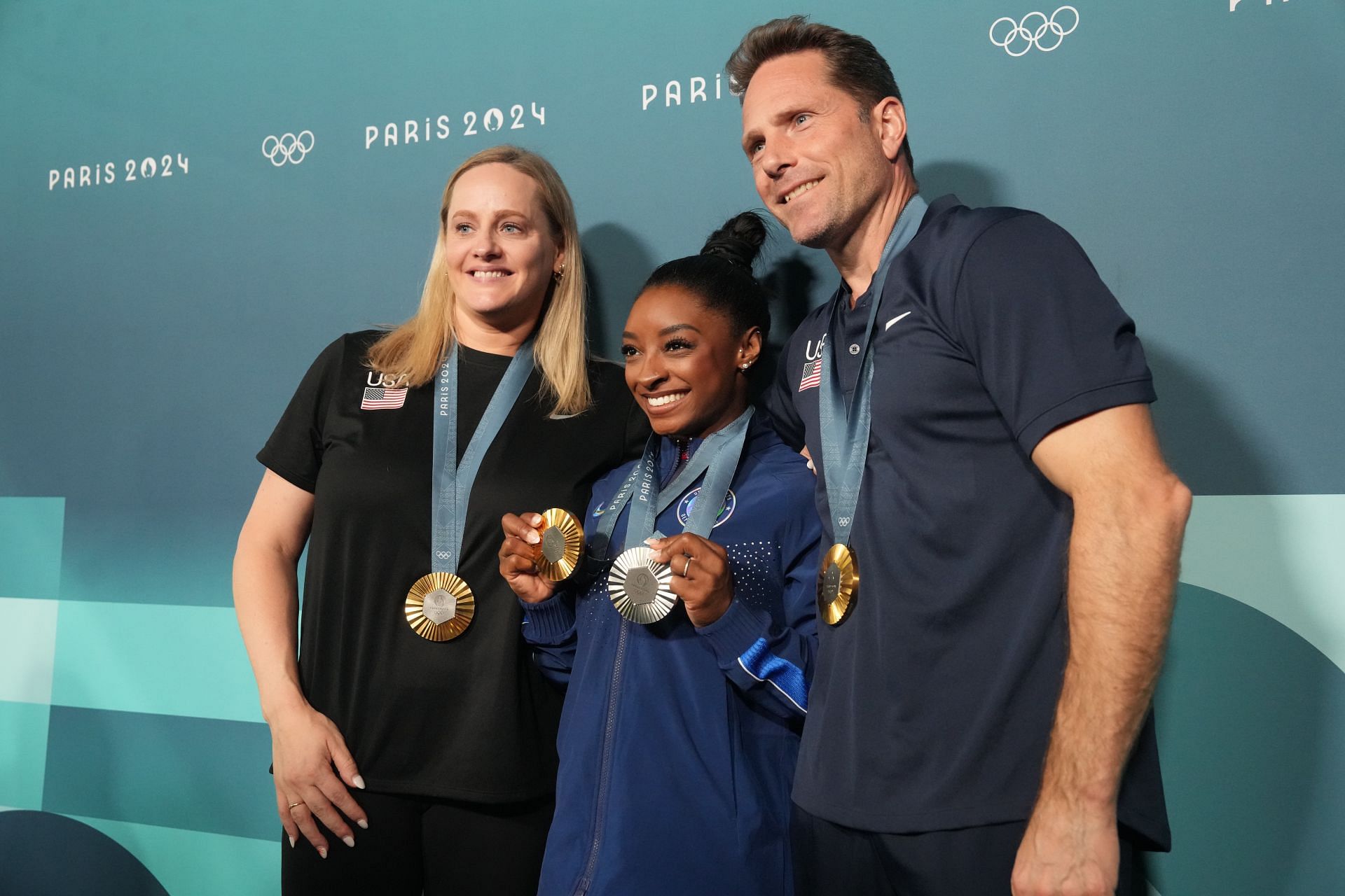 Cecile Landi and husband Laurent Landi pose with Simone Biles after the women&#039;s floor exercise finals at the Paris Olympics [Image Source: Getty]