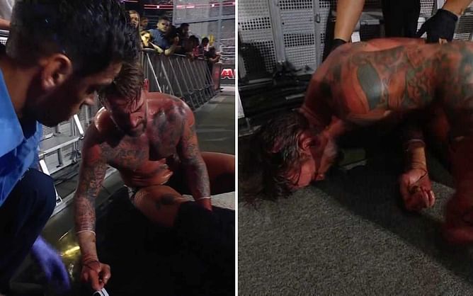 [VIDEO] CM Punk collapses outside of the ring after Hell in a Cell match; Gets immediate medical help