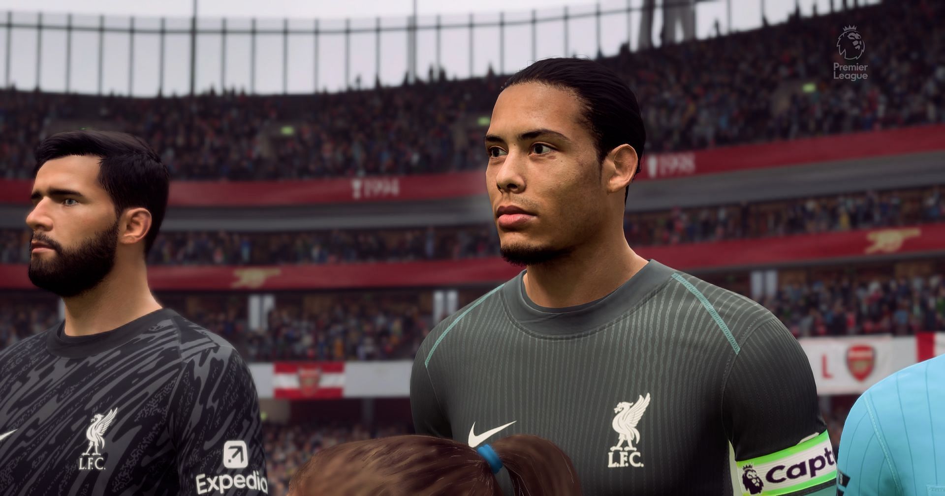 Virgil van Dijk and Alisson in the game (Image via EA Sports)