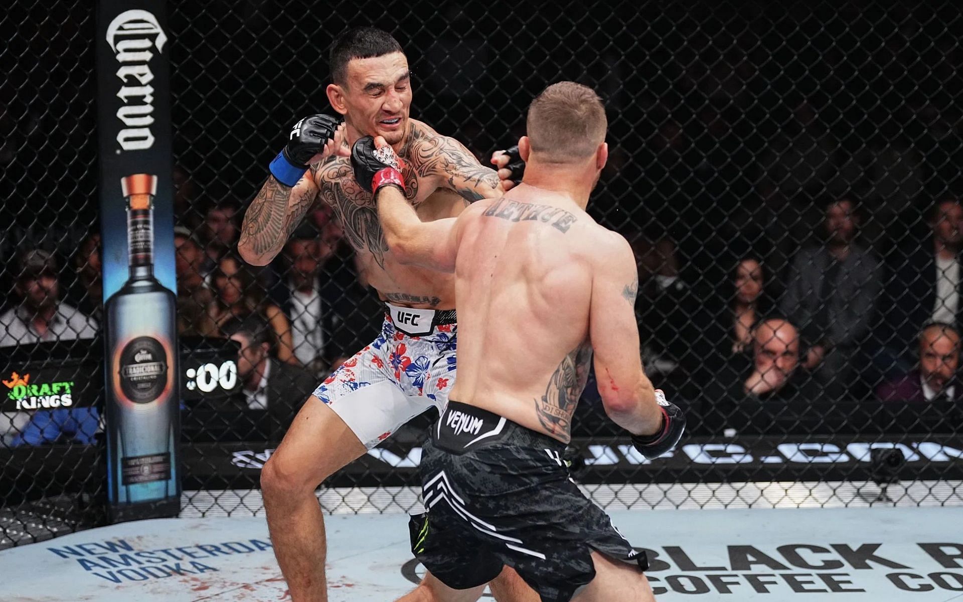 Max Holloway (left) answers if Justin Gaethje (right) dropped him during their UFC 300 clash [Image courtesy: Getty Images]