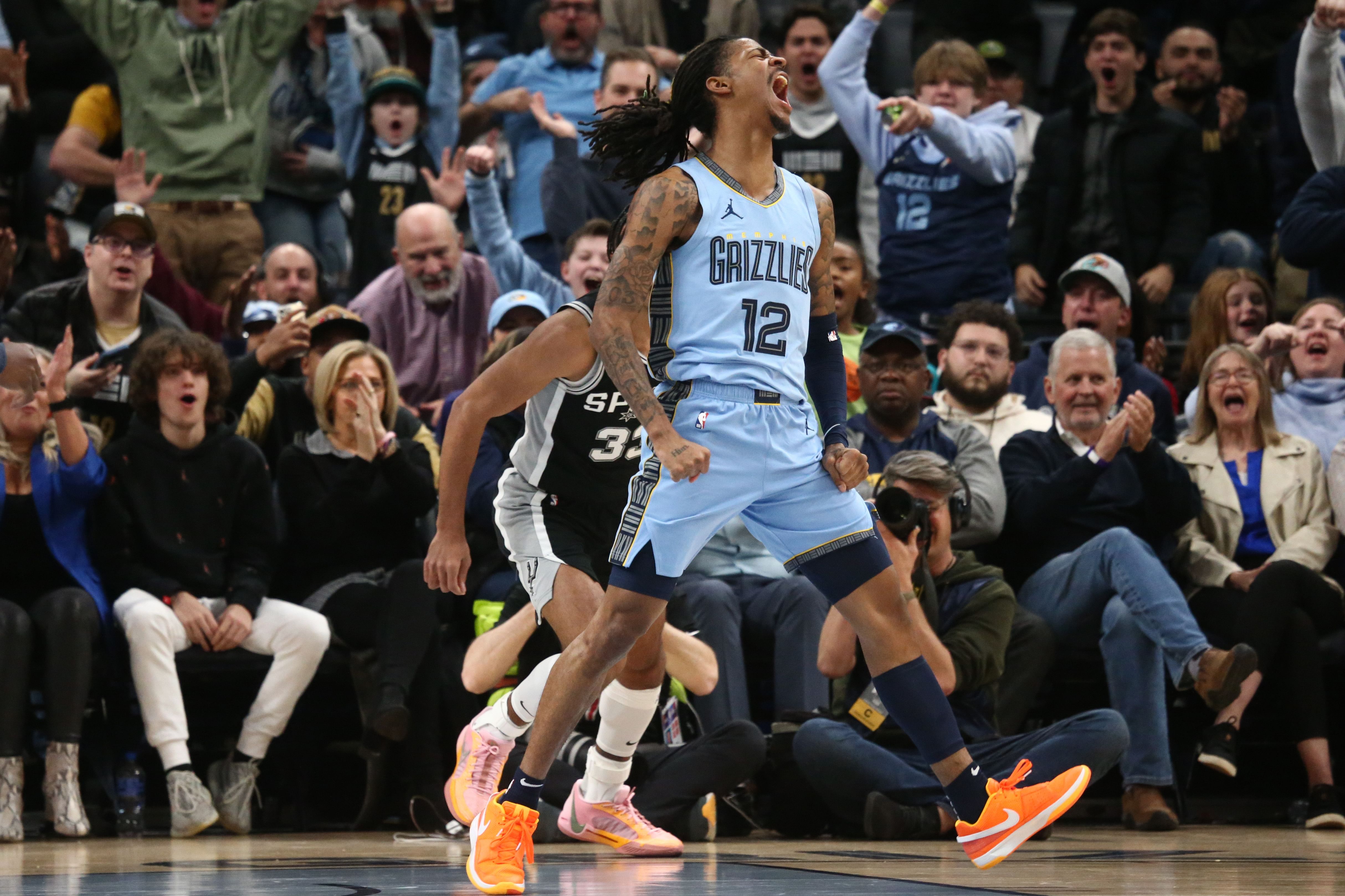 Memphis Grizzlies guard Ja Morant reacts after a dunk against the San Antonio Spurs at FedExForum. Photo Credit: Imagn