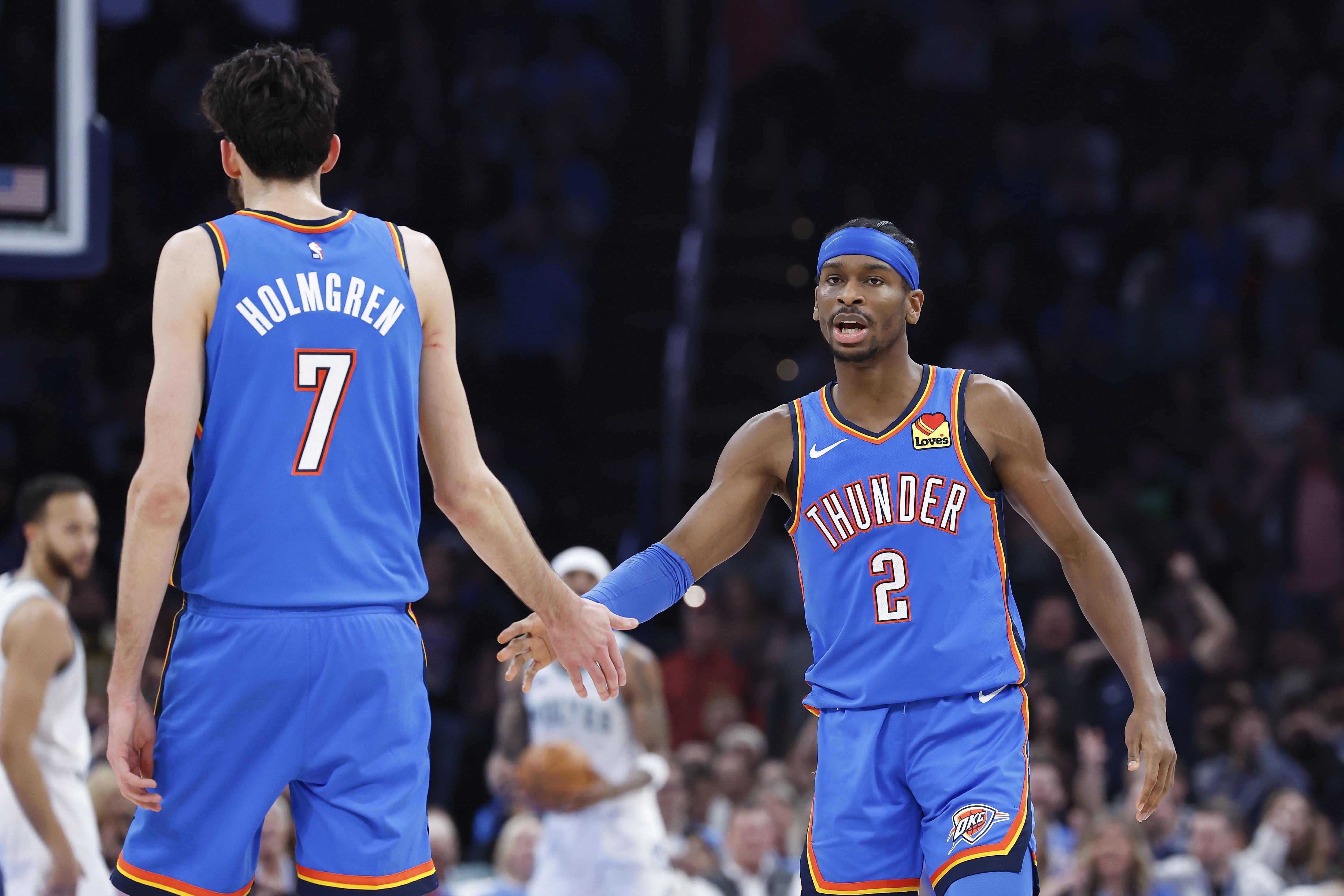 Oklahoma City Thunder&#039;s Shai Gilgeous-Alexander and Chet Holmgren celebrate after a play against the Minnesota Timberwolves at Paycom Center. Photo Credit: Imagn