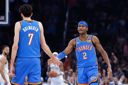 Oklahoma City Thunder's Shai Gilgeous-Alexander and Chet Holmgren celebrate after a play against the Minnesota Timberwolves at Paycom Center. Photo Credit: Imagn