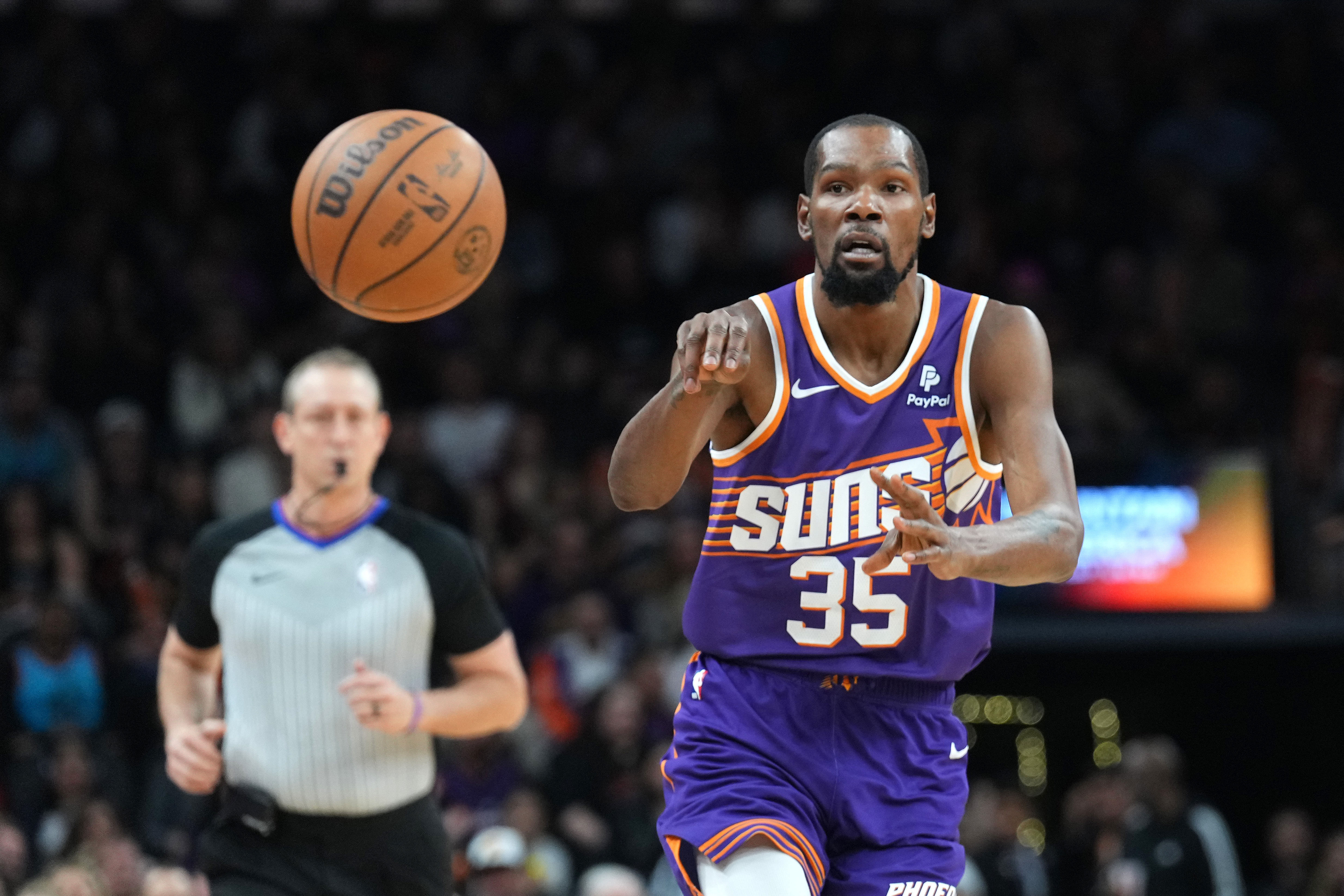 Phoenix Suns forward Kevin Durant (passes the against the Detroit Pistons at Footprint Center. Photo Credit: Imagn