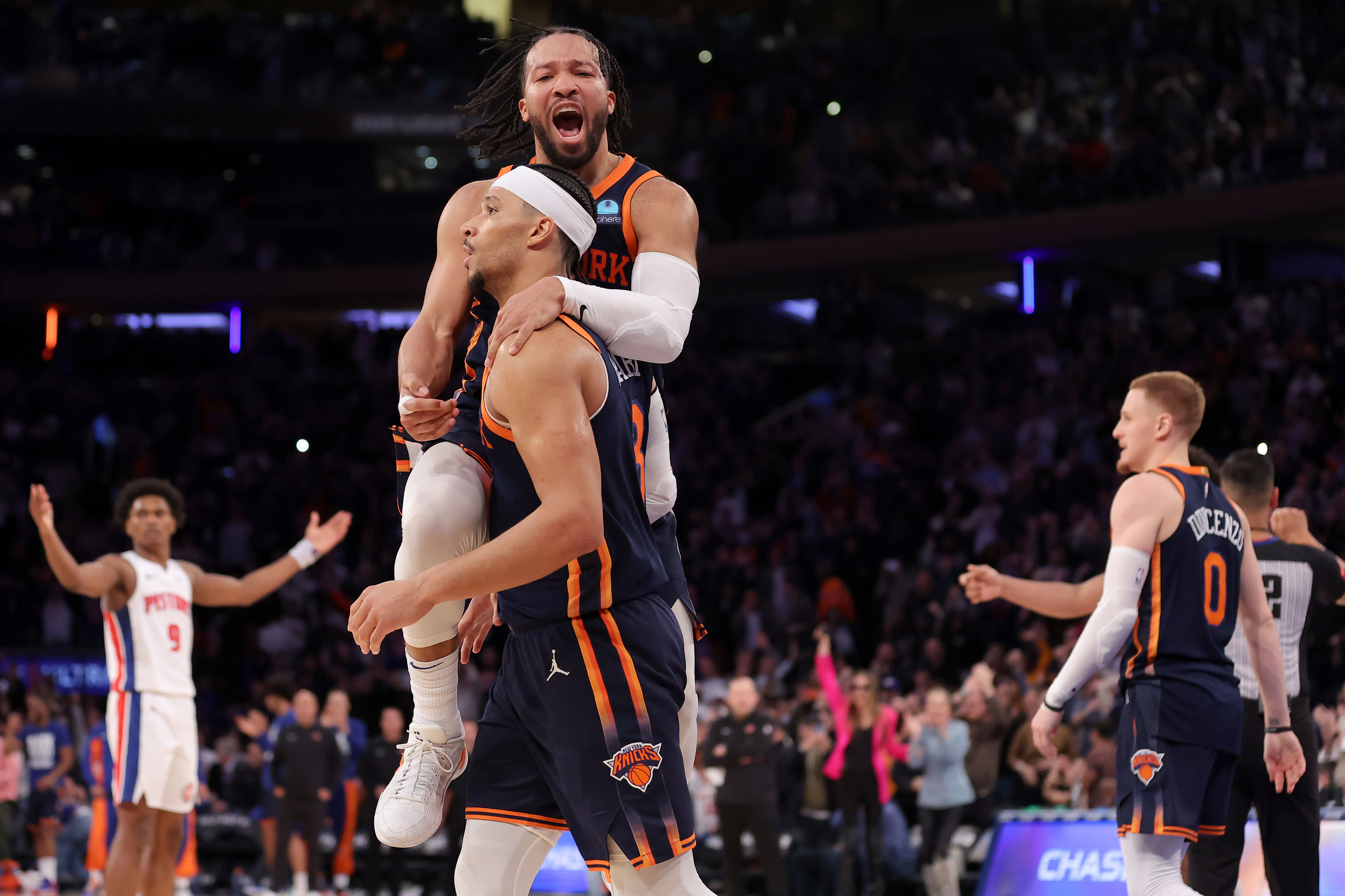 New York Knicks guard Jalen Brunson celebrates with Josh Hart against the Detroit Pistons at Madison Square Garden. Photo Credit: Imagn