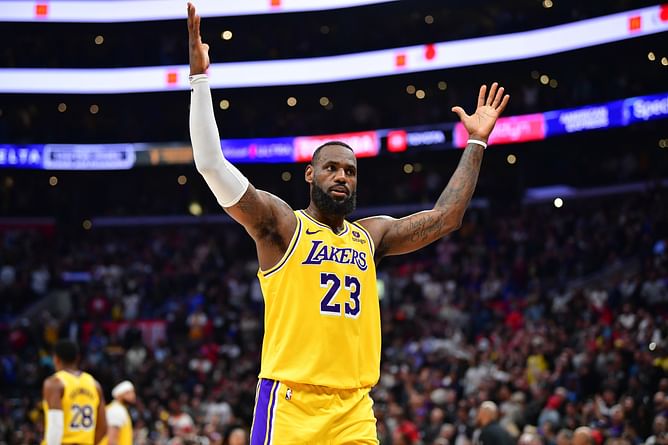 Watch: LeBron James crowns himself with King celebration on big screen while watching Dodgers vs. Padres Game 5 with Savannah James