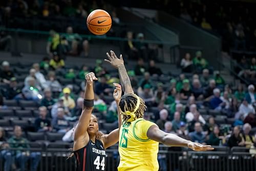 Former Stanford forward Kiki Iriafen puts up a shot under coverage - Source: Imagn