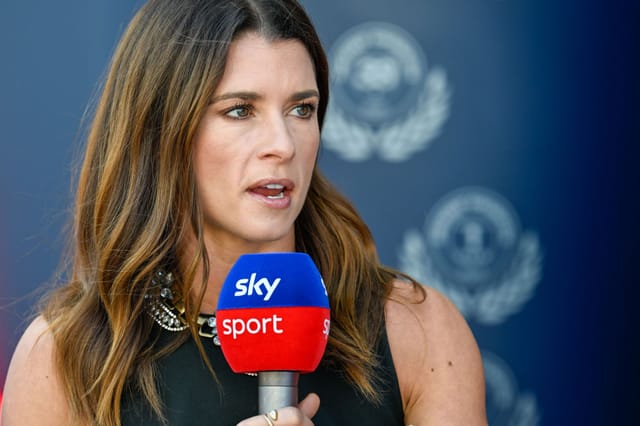 Danica Patrick turns heads in fringed black dress paired with statement  necklace at F1 United States GP