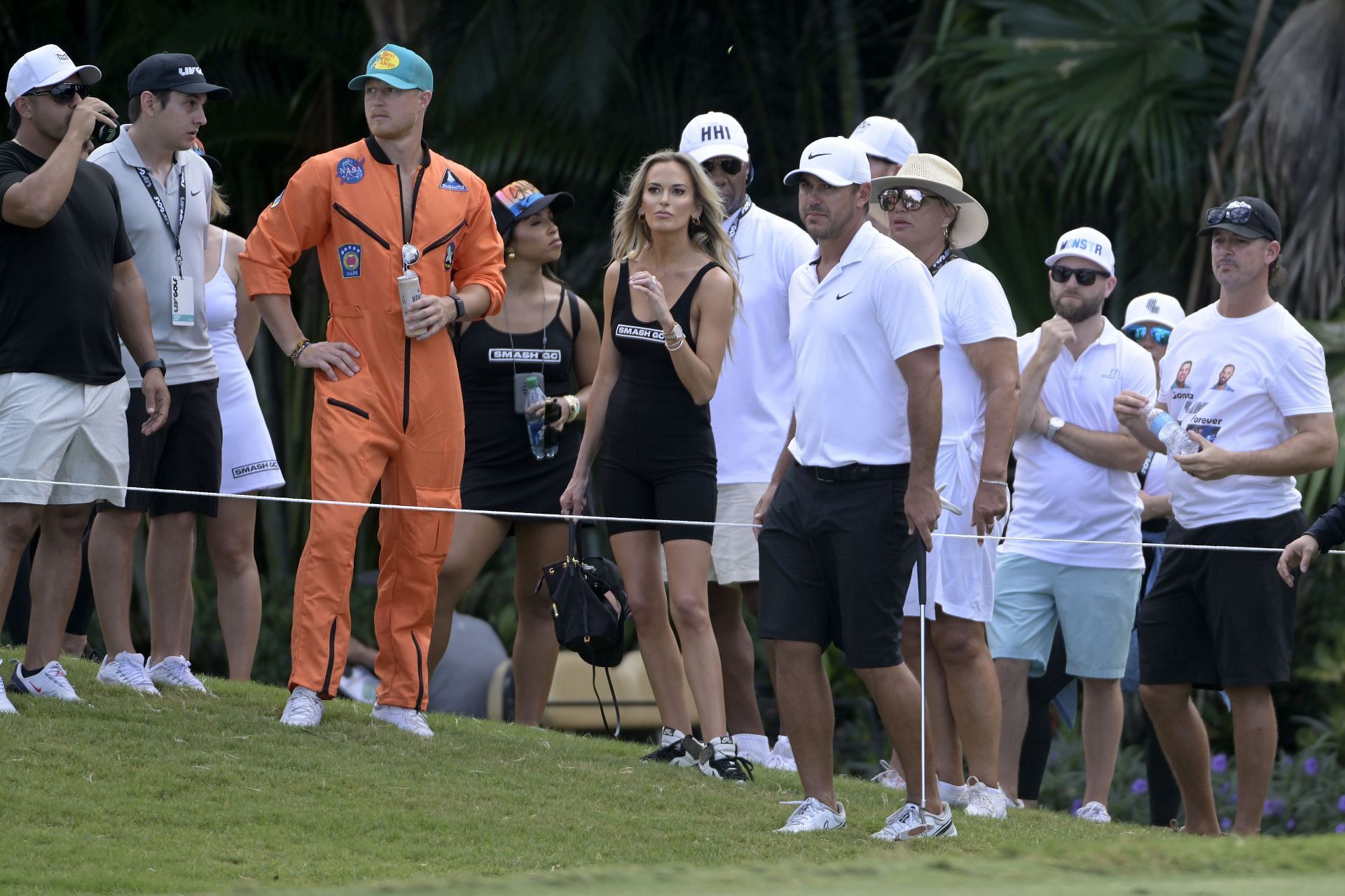 Jena Sims and Brooks Koepka at a LIV Golf event in 2022 (Image via Getty)