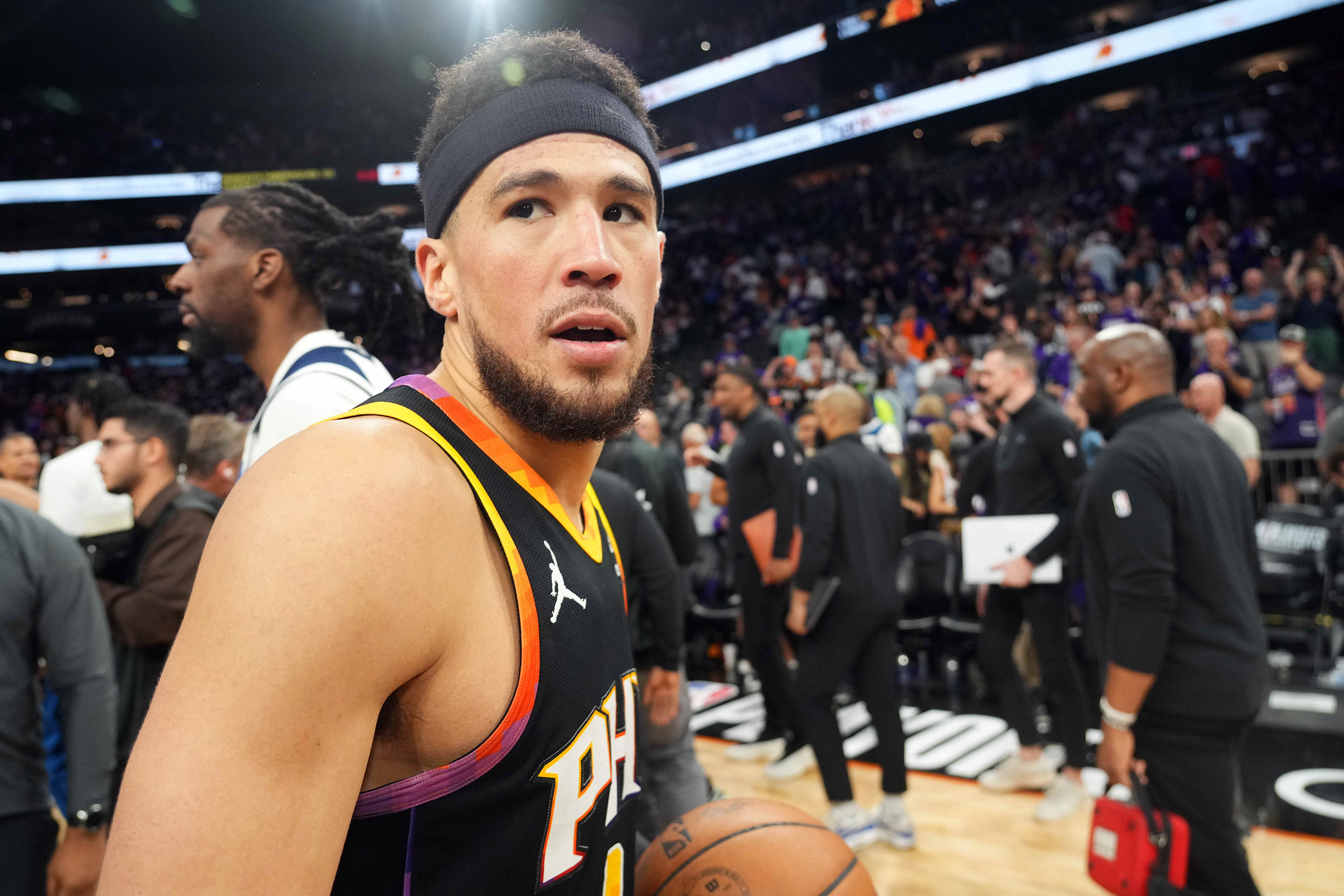 Phoenix Suns guard Devin Booker leaves the court after game four of the first round for the 2024 NBA playoffs at Footprint Center. Photo Credit: Imagn