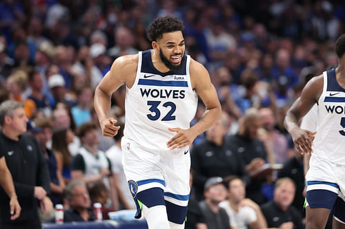 Karl-Anthony Towns reacts against the Dallas Mavericks during at American Airlines Center. Photo Credit: Imagn