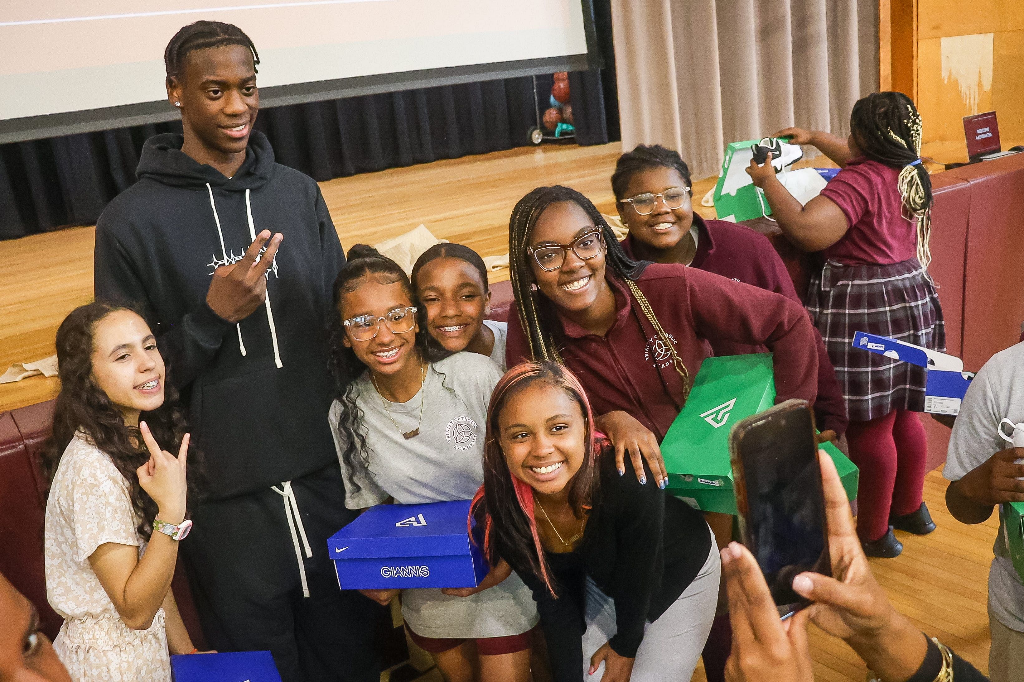 Brockton&#039;s AJ Dybantsa, the nation&#039;s top-ranked basketball recruit in the 2025 class, donated Nike gear to students at Trinity Catholic Academy in Brockton. Photo Credit: Imagn