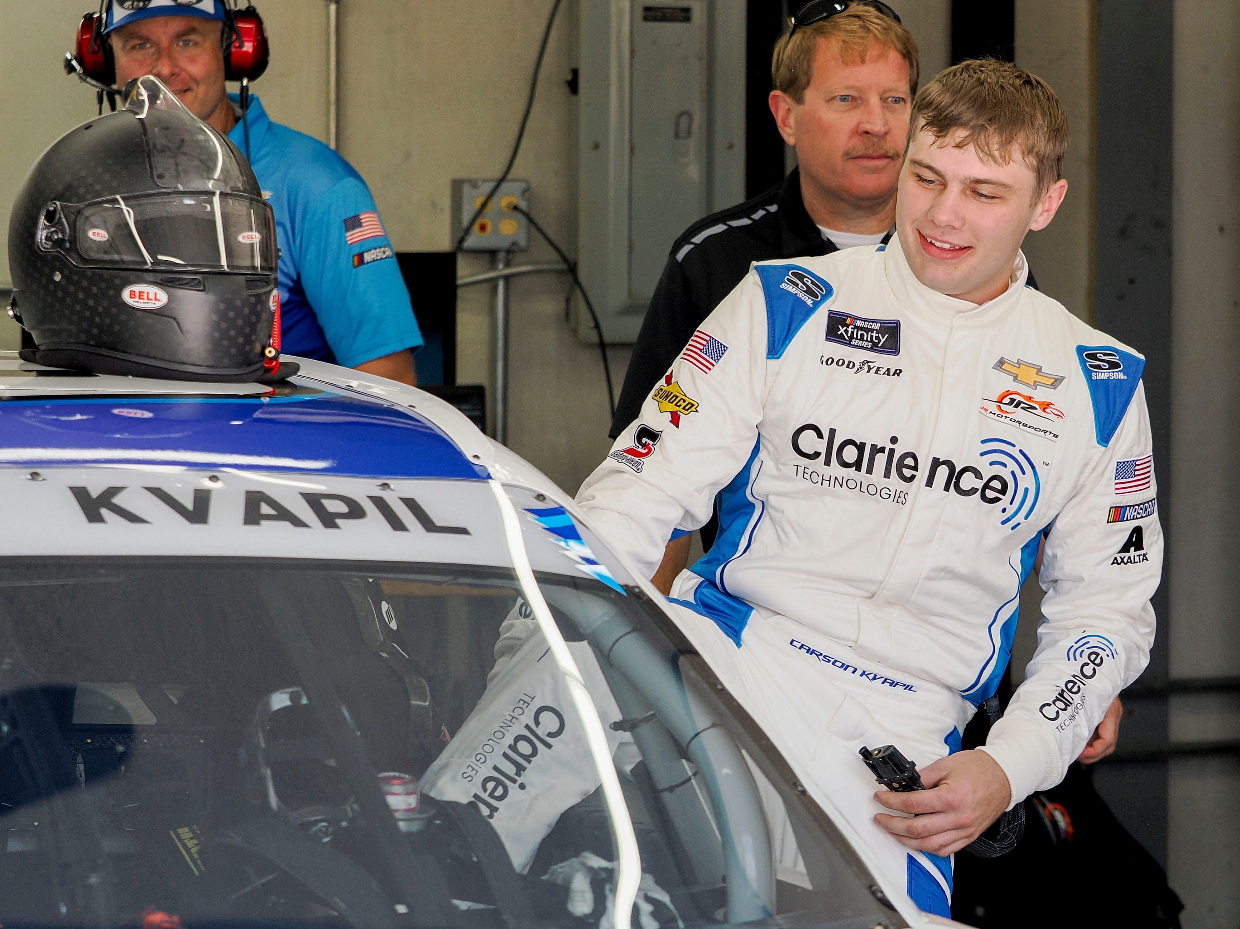 NASCAR Xfinity Series driver Carson Kvapil (88) climbs into his car Friday, July 19, 2024, during practice for the Pennzoil 250 at Indianapolis Motor Speedway (Source: Imagn)