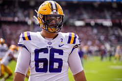 WATCH: LSU's Will Campbell shows off his alligator hunting skills in the swamp with NIL partner