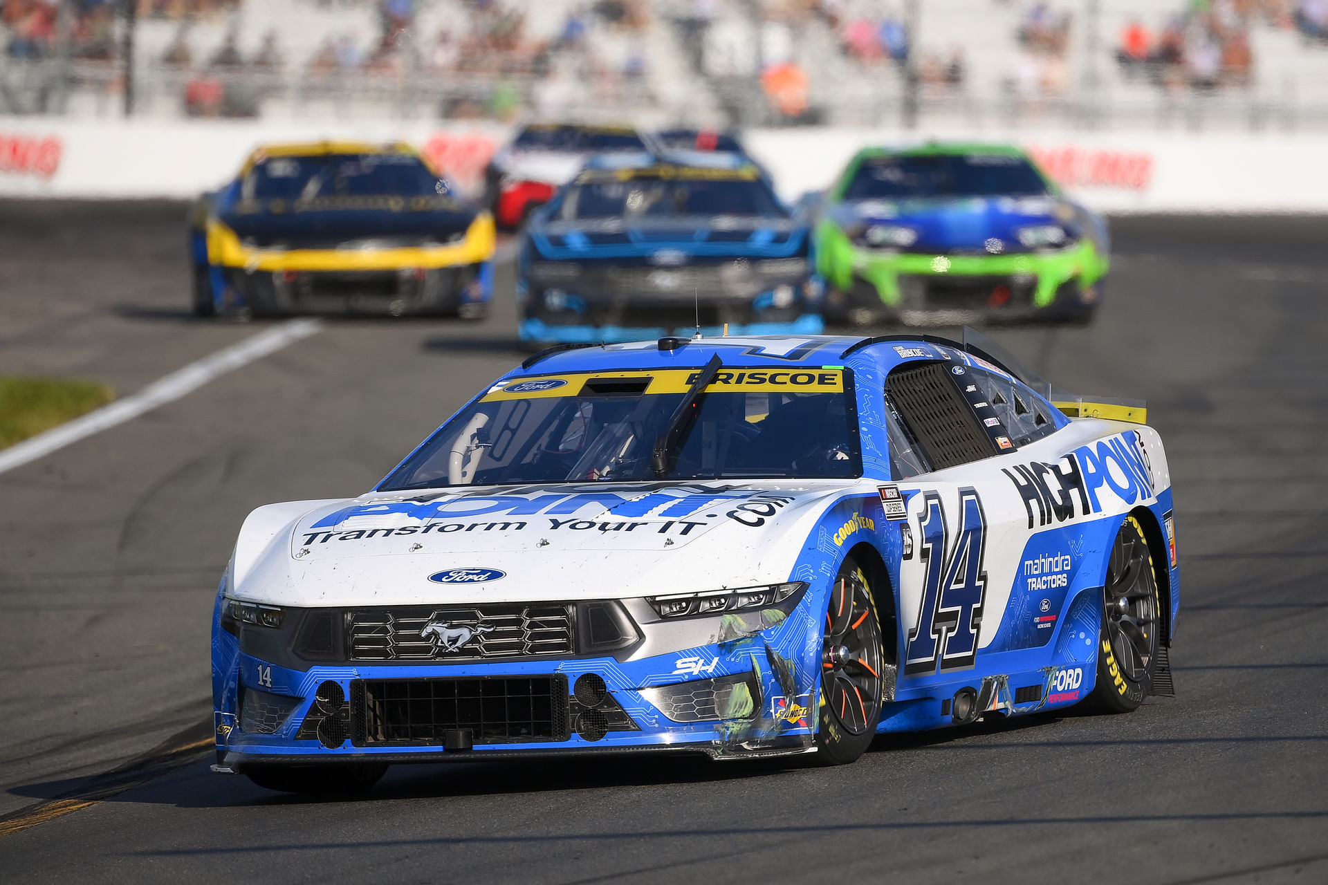 Chase Briscoe (14) leads a group of cars during the Go Bowling at The Glen at Watkins Glen (Source: Imagn)