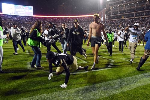 Colorado Buffaloes wide receiver Travis Hunter (12) falls in the end zone - Source: Imagn