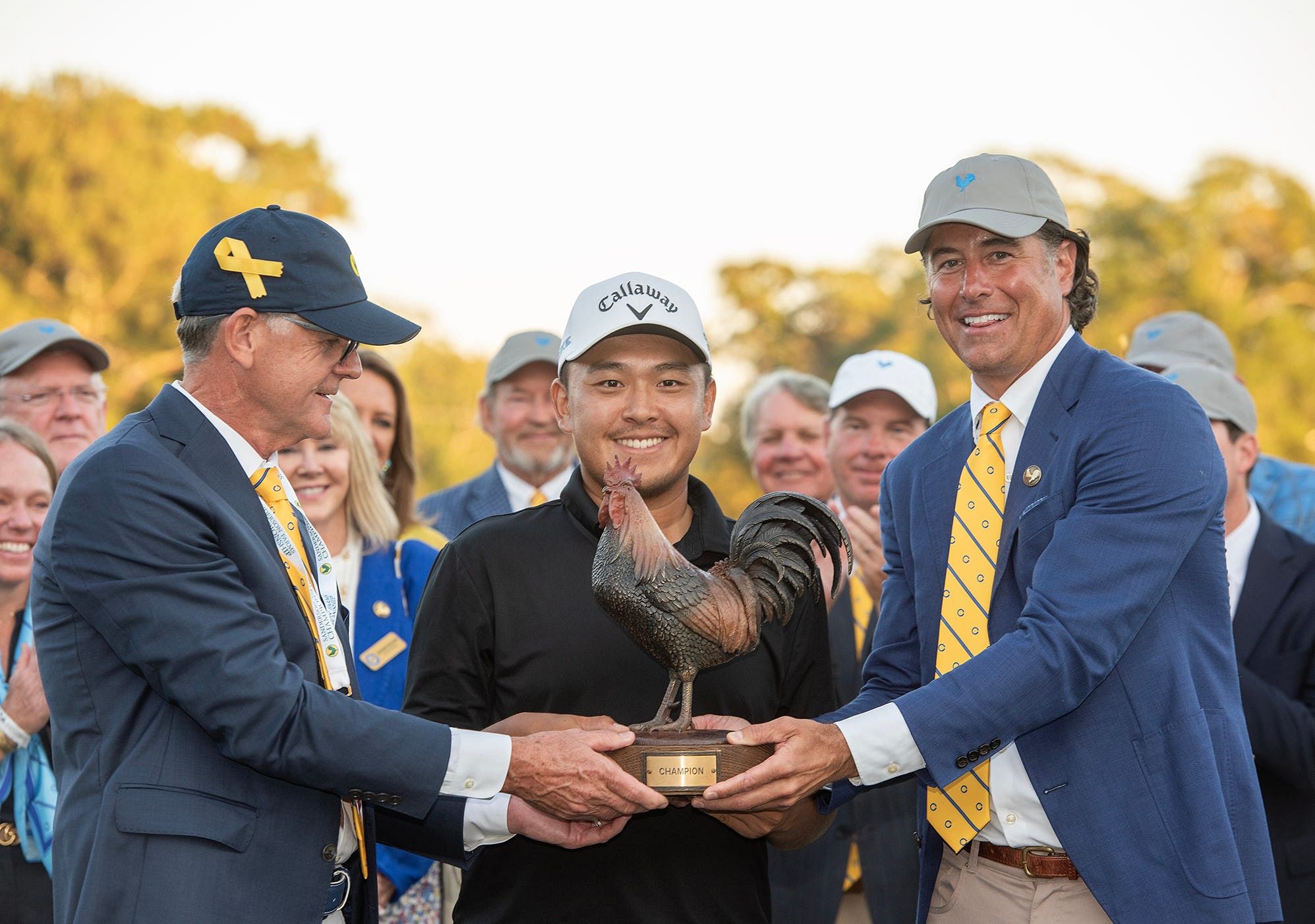 Kevin Yu poses with a trophy after winning the Sanderson Farms Championship 2024 (Image Source: Imagn)