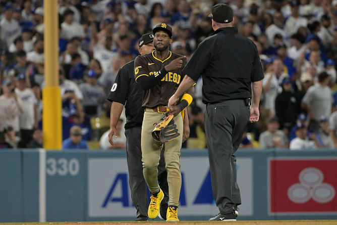WATCH: Dodgers fan caught throwing beer in the left field where Jurickson Profar was stationed goes viral