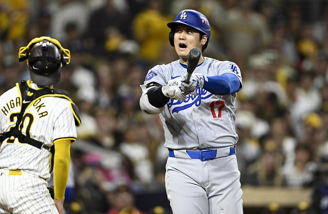 “Ump has money on the padres”; “He would have been safe” - Dodgers fans upset as Shohei Ohtani gets out at home plate after umpire gets in the way