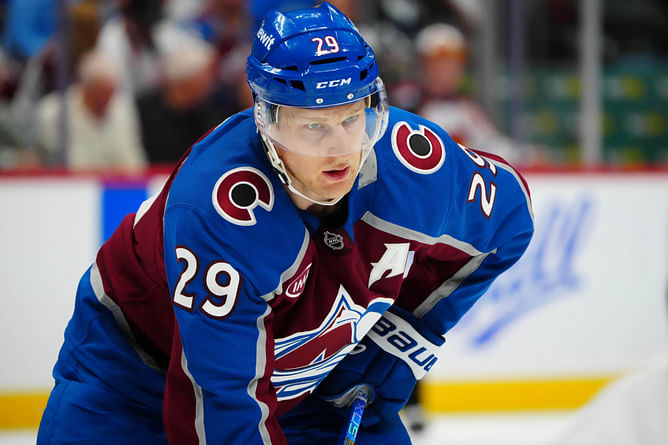 WATCH: Avs-Isles tilt ensues as Nathan MacKinnon lands a huge hit on Alexander Romanov