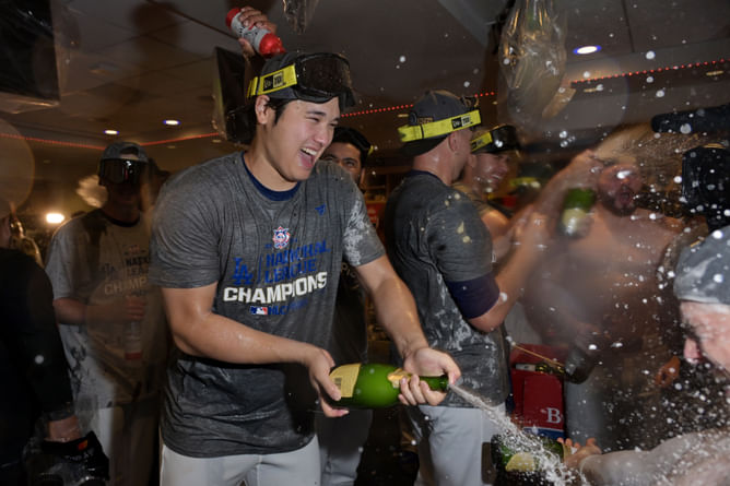Watch: Shohei Ohtani and Dave Roberts shower each other with beer in postgame celebration after clinching NL pennant