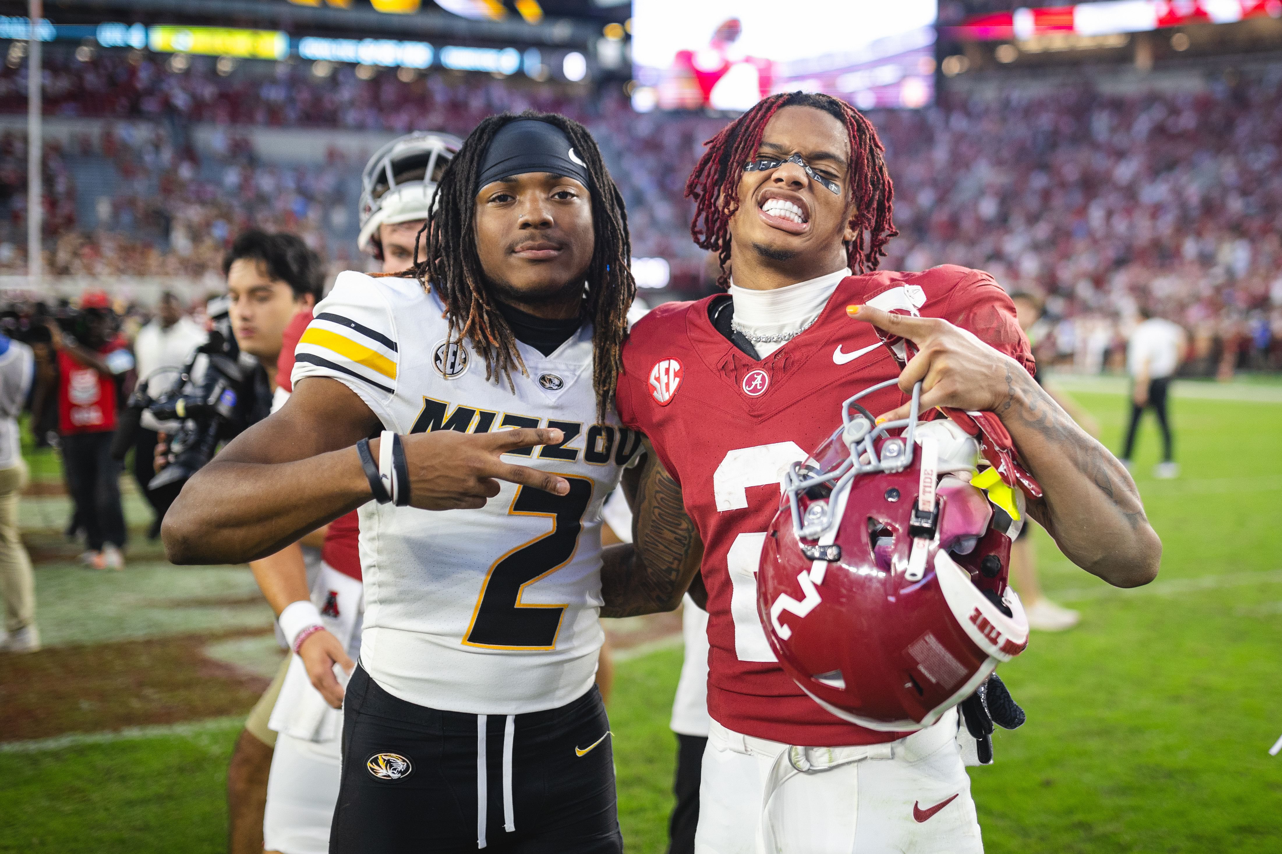 Missouri Tigers wide receiver Marquis Johnson (2) poses for a photo with Alabama Crimson Tide wide receiver Ryan Williams (2) - Source: Imagn