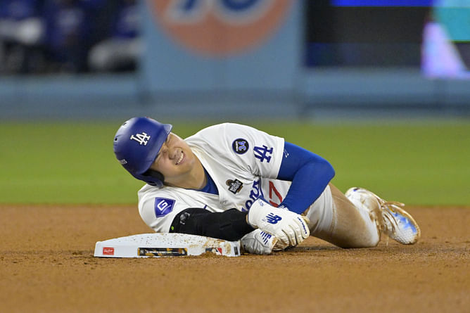 WATCH: Concerning scenes as Shohei Ohtani hurts himself in World Series Game 2 vs Yankees during daring base-stealing attempt, leaves field in pain