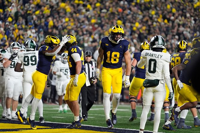 WATCH: Massive fight breaks out between Michigan & Michigan State players after game ends in Wolverines' favor