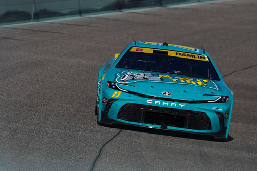 NASCAR Cup Series driver Denny Hamlin (11) races during the Straight Talk Wireless 400 (Source: Imagn)