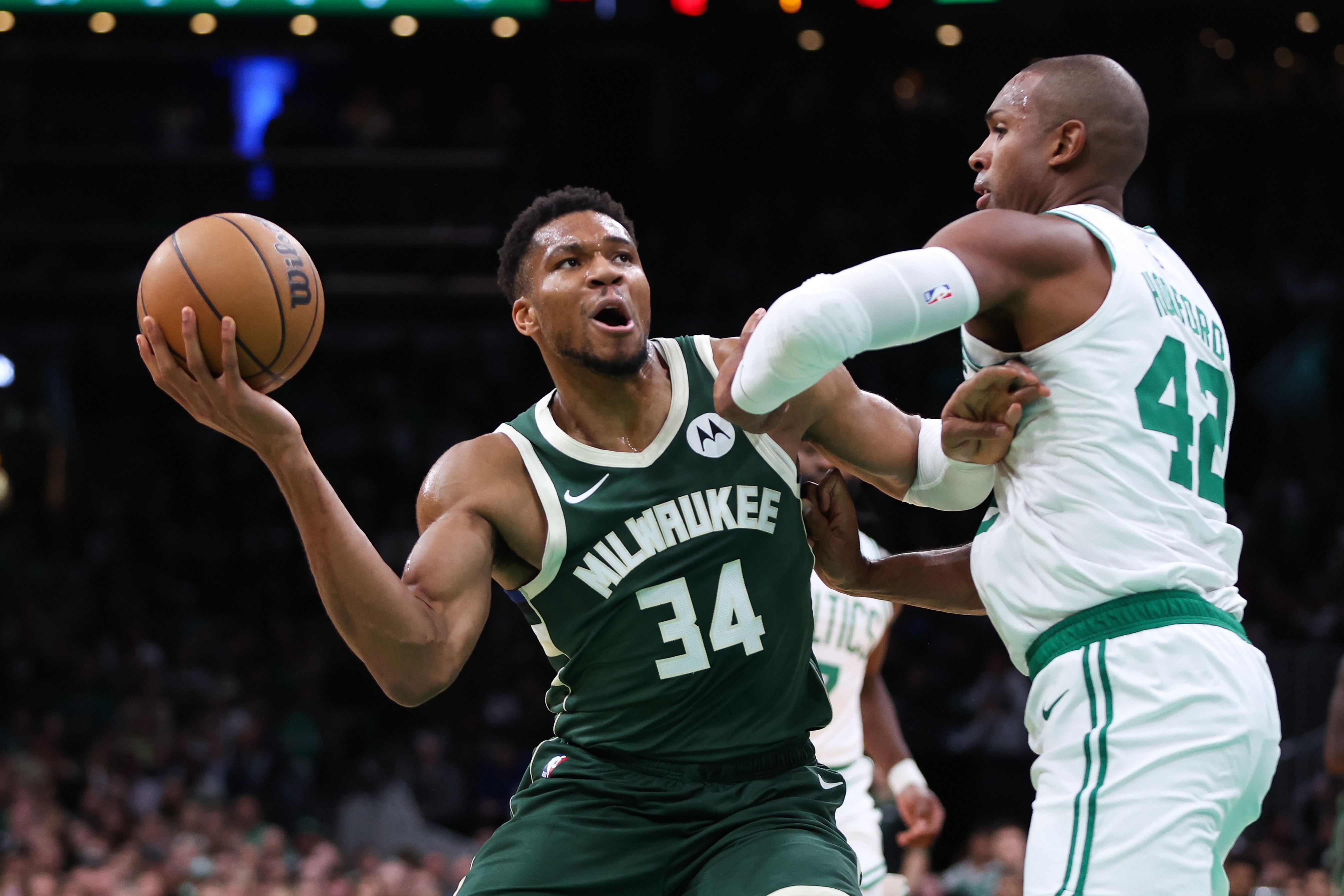 Milwaukee Bucks forward Giannis Antetokounmpo drives to the basket defended by Boston Celtics center Al Horford at TD Garden. Mandatory Credit: Imagn