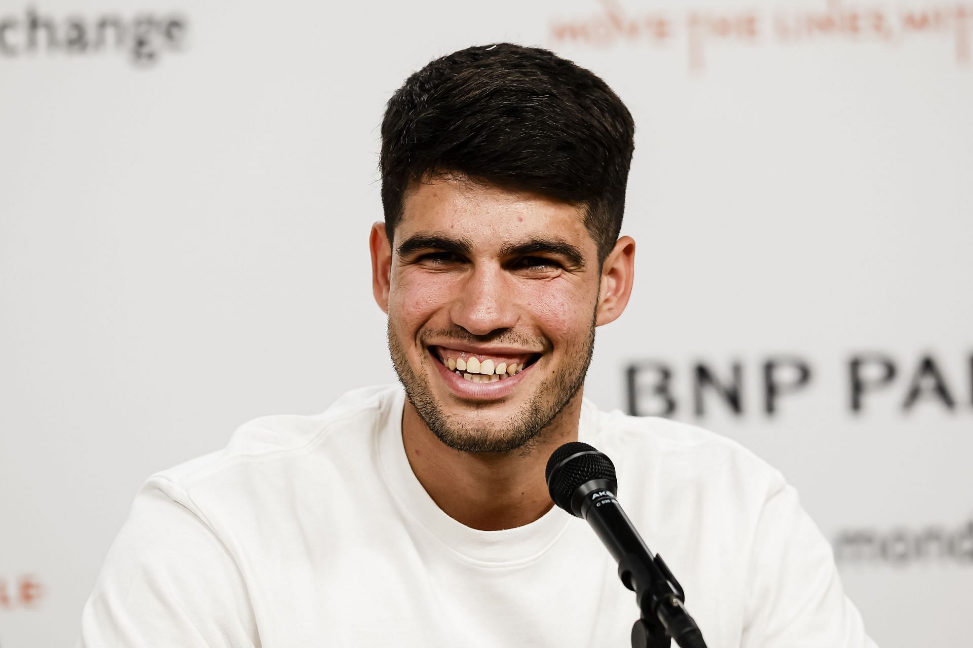 Carlos Alcaraz pictured talking to the press [Source: Getty]